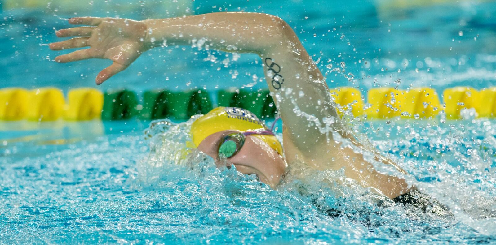 Erika Sektenreich-Hodgson competes in U SPORTS Swimming Championship preliminary round. (credit Yves Longpré)