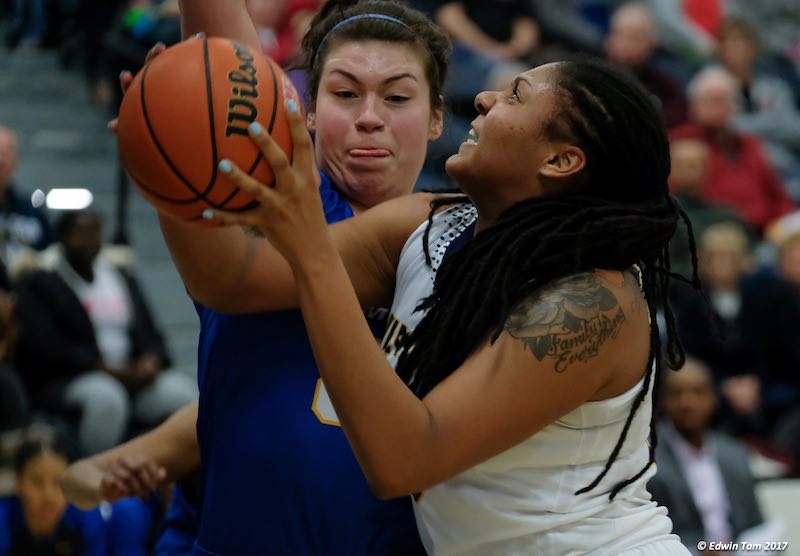 Cheyanne Roger can be seen battling the post to grab offensive and defensive rebounds, or blocking shots for the Windsor Lancers. (Photo credit: Edwin Tam)